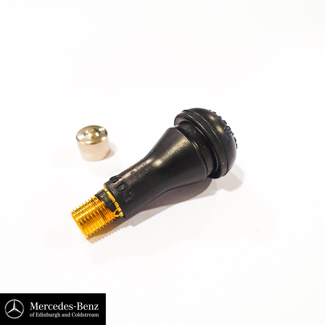 Tyre valve with metal cap