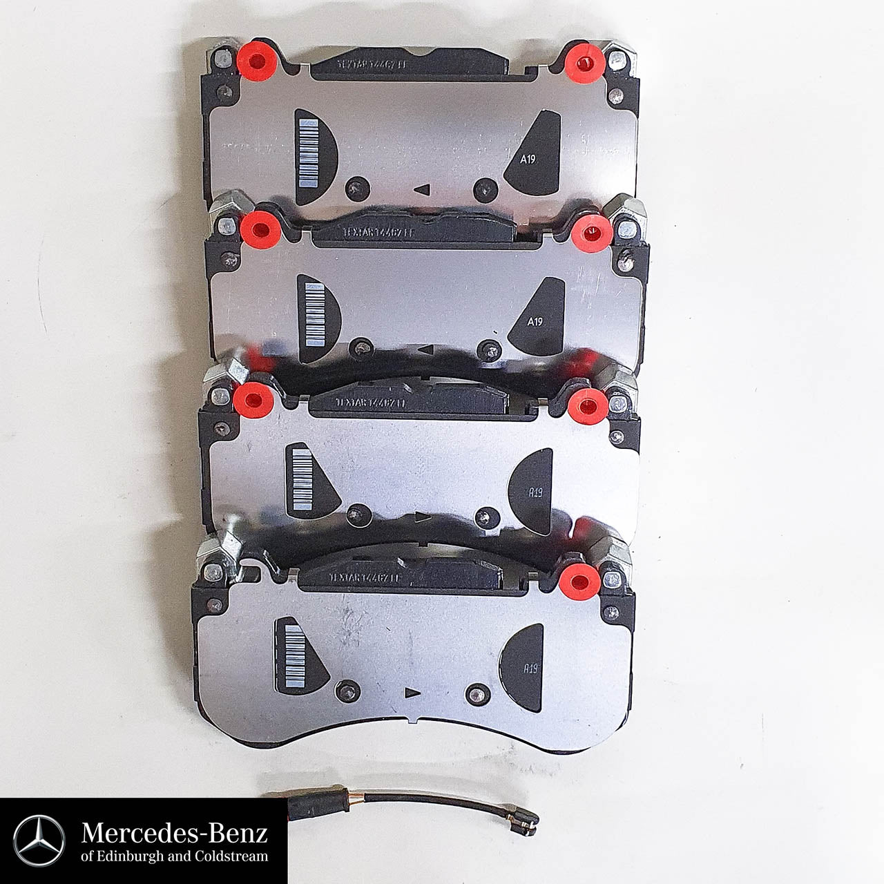 Genuine Mercedes-Benz AMG front brake pads and wear sensor