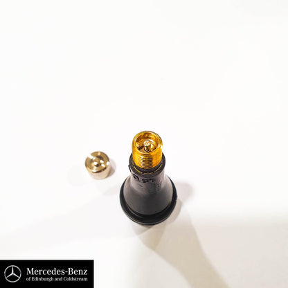 Tyre valve with metal cap