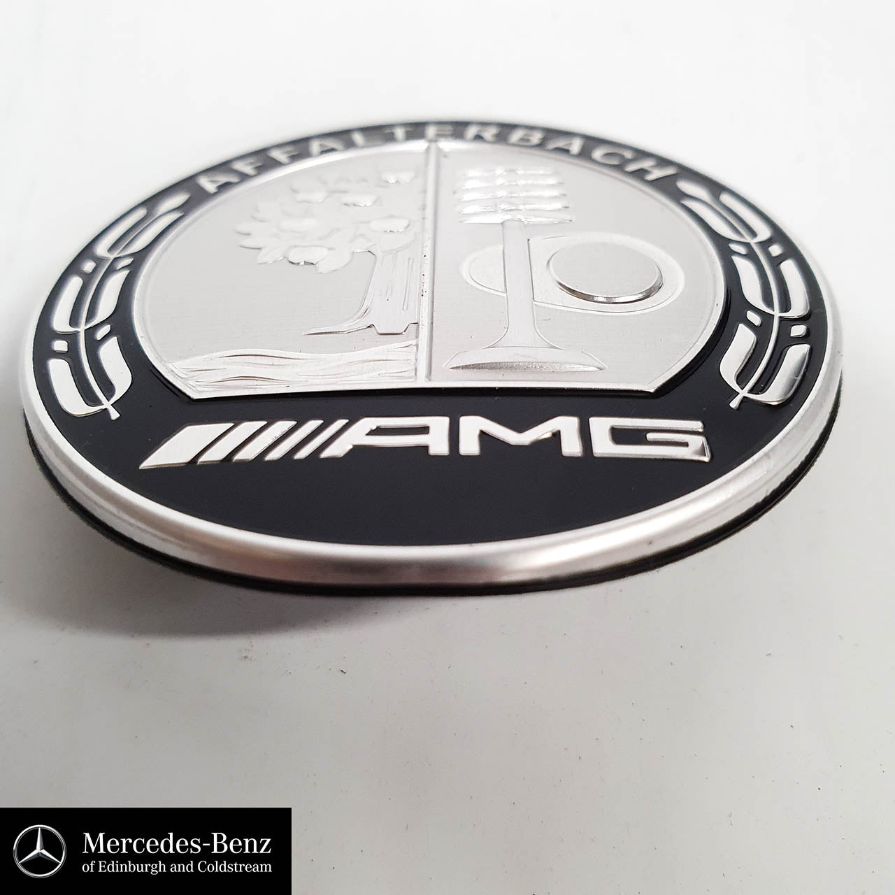 Mercedes Benz Chromium Grille With Benz Star And Amg Logo With Led  Headlight Of Black C Class C200 Coupe AMG Model In The Dark Garage During  Maintainance Checking Service Stock Photo, Picture